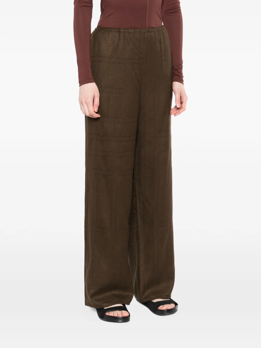 Pantaloni con cuciture a vista