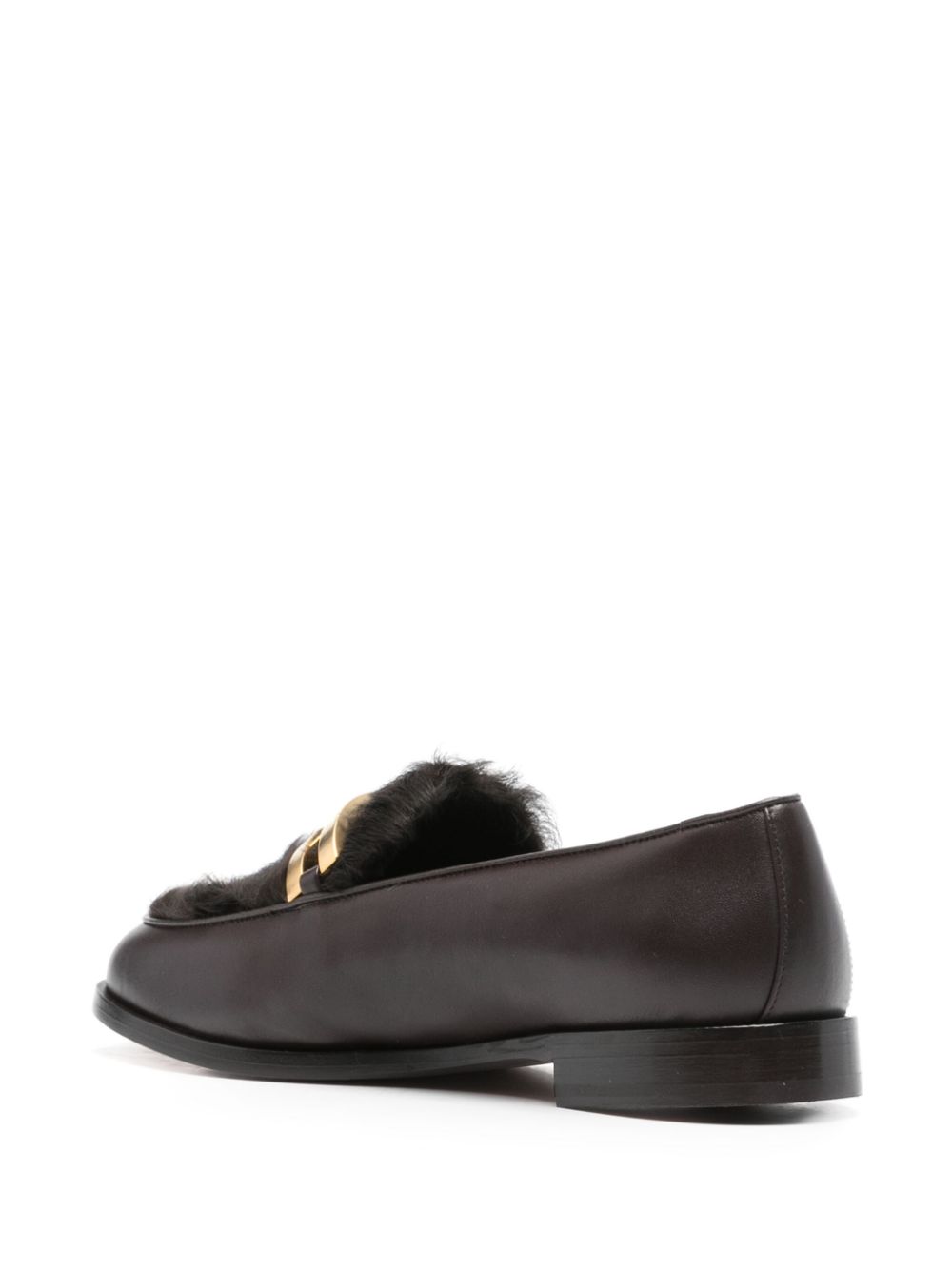 Mocassini con bordo in shearling