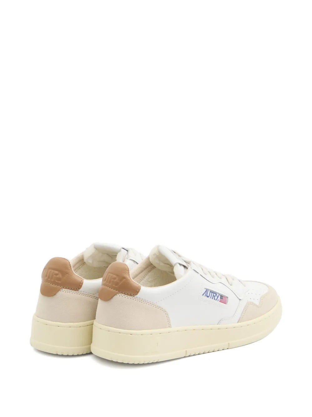 Sneakers traforate in pelle scamosciata
